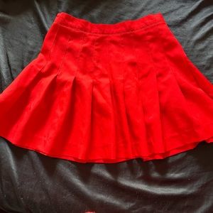Red pleated skirt. Size 8. Never worn.
